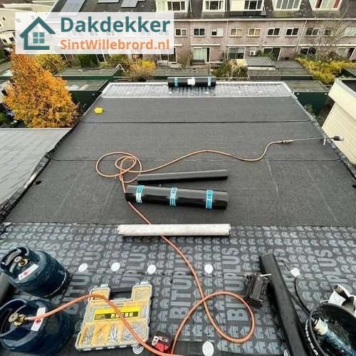 Plat dak opnieuw leggen Plat dak SintWillebrord opnieuw leggen